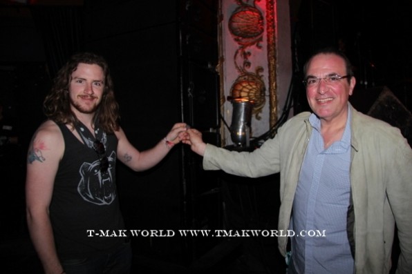 Pat Wilken of TimeGiant getting Geezer Butler's pick from John Perfetto of T-Mak World