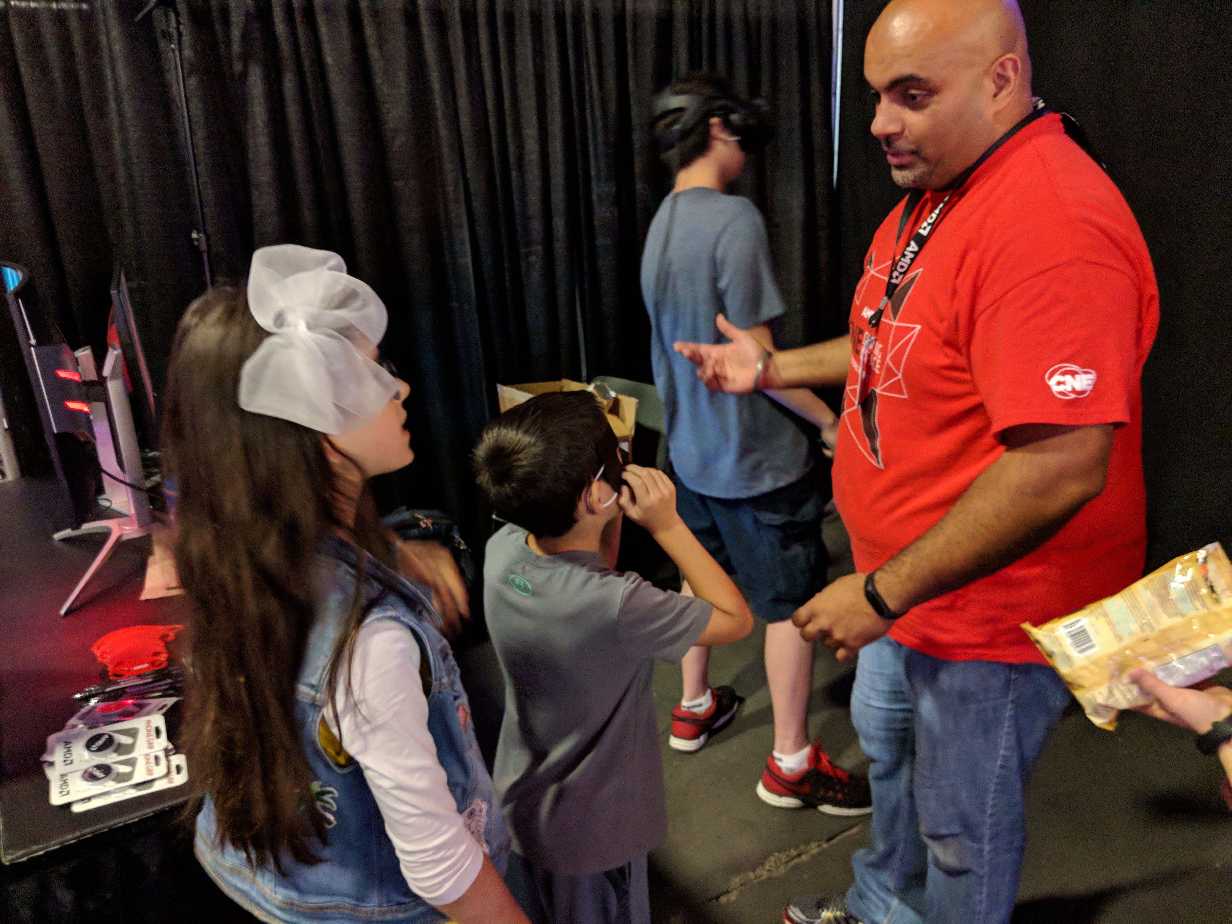 Sher one of the many AMD volunteers talking to kids about VR