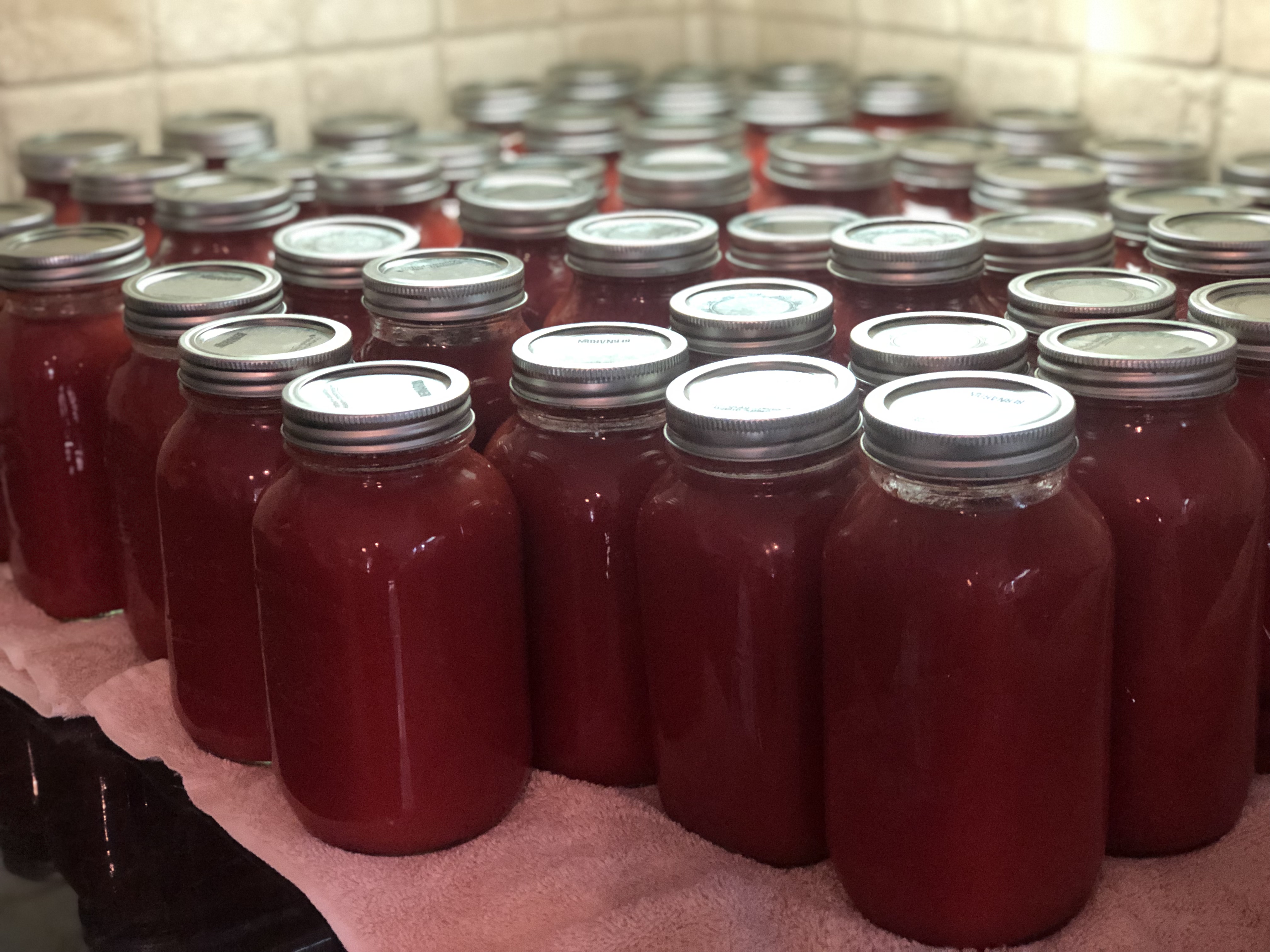 Canning tomatoes is easy. Jars ready for storage.